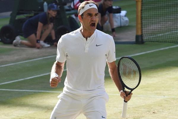 Federer 'dạo chơi' trước Raonic, vào bán kết Wimbledon